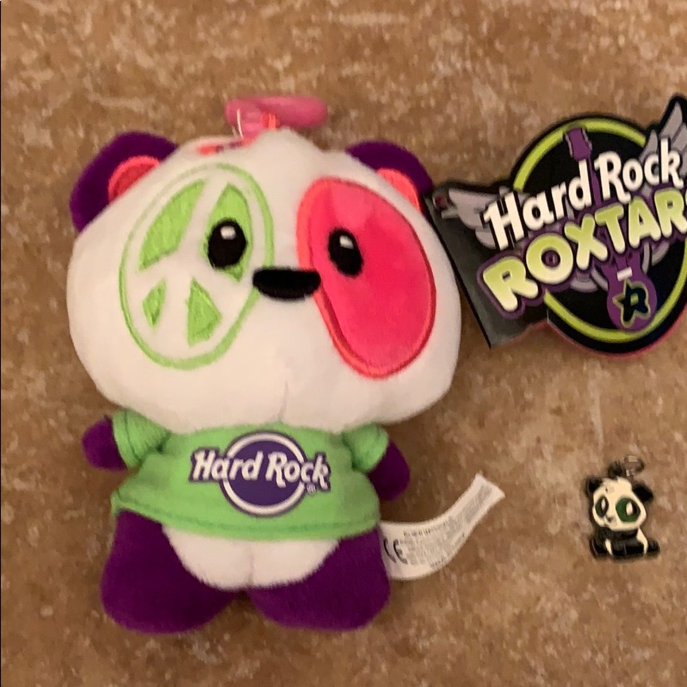 Hard rock Roxtars panda stuffed animal with panda charm.